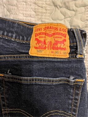 Levi's Men’s 505 Straight Jeans in Dark Indigo with Tan Patch
